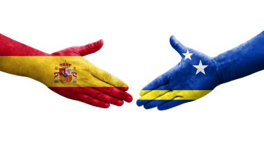 Curacao ve İspanya bayrakları arasındaki el sıkışma, izole şeffaf görüntü.