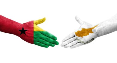 Kıbrıs Rum Kesimi ile Gine Bissau bayrakları arasındaki el sıkışma, izole şeffaf görüntü.