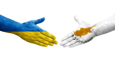 Kıbrıs Rum Kesimi ile Ukrayna bayrakları arasındaki el sıkışma, izole edilmiş şeffaf görüntü.