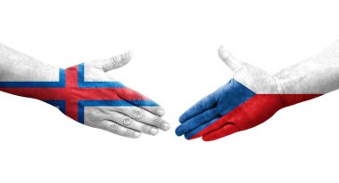 Çek ve Faroe Adaları bayrakları arasında el sıkışma, izole şeffaf görüntü.