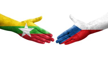 Çek ve Myanmar bayrakları arasındaki tokalaşma elleri boyalı, izole şeffaf görüntü.