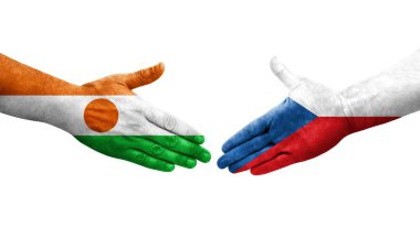 Çek ve Nijer bayrakları arasındaki tokalaşma elleri boyalı, izole şeffaf görüntü.