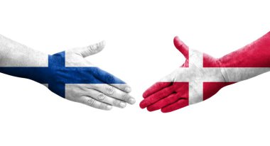 Danimarka ve Finlandiya bayrakları arasında el sıkışma, izole saydam resim.