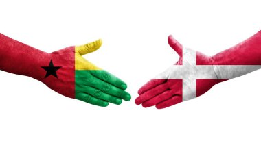 Danimarka ve Gine Bissau bayrakları arasındaki el sıkışma, izole şeffaf görüntü.