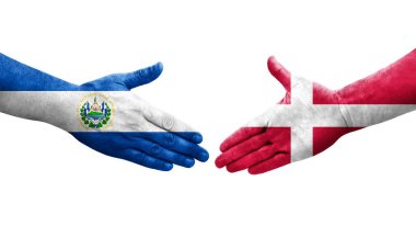 Danimarka ve El Salvador bayrakları arasında el sıkışma, izole şeffaf görüntü.