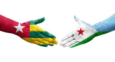 Cibuti ve Togo bayrakları arasındaki el sıkışma ellerinde resmedilmiş şeffaf görüntü.