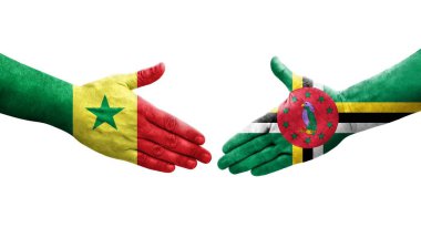 Dominica ve Senegal bayrakları arasındaki el sıkışma, izole şeffaf görüntü.