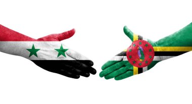 Dominika ve Suriye bayrakları arasındaki el sıkışma, izole şeffaf görüntü.
