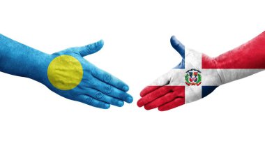 Dominik Cumhuriyeti ile Palau bayrakları arasındaki el sıkışma..