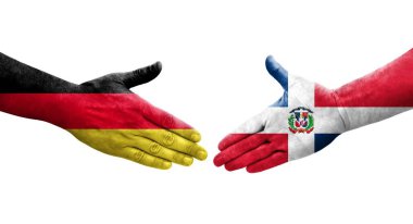 Dominik Cumhuriyeti ve Almanya bayrakları arasındaki el sıkışma, izole şeffaf görüntü.