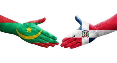 Dominik Cumhuriyeti ve Moritanya bayrakları arasındaki el sıkışma, izole şeffaf görüntü.