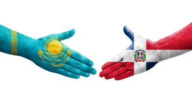 Dominik Cumhuriyeti ile Kazakistan bayrakları arasındaki el sıkışma, izole şeffaf görüntü.