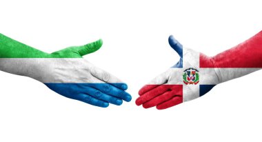 Dominik Cumhuriyeti ile Sierra Leone bayrakları arasındaki el sıkışma..
