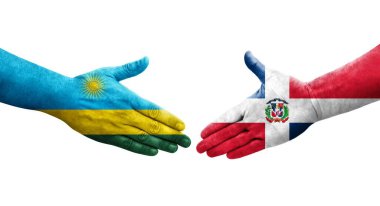 Dominik Cumhuriyeti ve Ruanda bayrakları arasındaki el sıkışma, izole şeffaf görüntü.