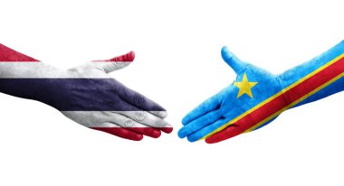 Dr Kongo ve Tayland bayrakları arasındaki el sıkışma ellerinde izole şeffaf görüntü.