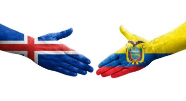 Ellere boyanmış Ekvador ve İzlanda bayrakları arasındaki el sıkışma, izole şeffaf görüntü.