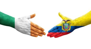 Ekvador ve İrlanda bayrakları arasındaki el sıkışma ellerinde resmedilmiş şeffaf görüntü.