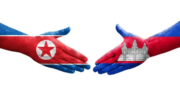 Aperto Mão Entre Camboja Coreia Norte Bandeiras Pintadas Mãos Imagem — Fotografia de Stock