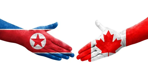 Apretón Manos Entre Canadá Corea Del Norte Banderas Pintadas Las —  Fotos de Stock