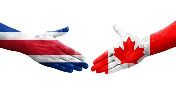 Handdruk Tussen Canada Costa Rica Vlaggen Geschilderd Handen Geïsoleerd Transparant — Stockfoto