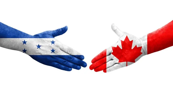 Handdruk Tussen Canada Honduras Vlaggen Geschilderd Handen Geïsoleerd Transparant Beeld — Stockfoto