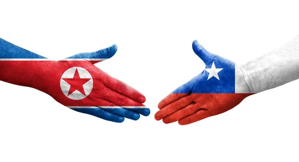 Χειραψία Μεταξύ Χιλής Και Βόρειας Κορέας Σημαίες Ζωγραφισμένα Στα Χέρια — Φωτογραφία Αρχείου