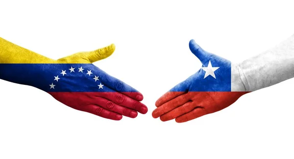 チリとベネズエラの旗の間の握手手に描かれた孤立した透明なイメージ — ストック写真