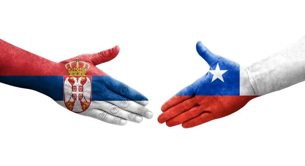 Mano Apretada Entre Banderas Chile Serbia Pintadas Las Manos Imagen — Foto de Stock