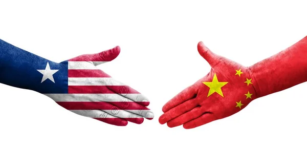 中国与利比里亚之间握手 手绘国旗 孤立透明的形象 — 图库照片