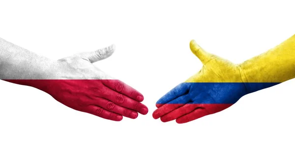 stock image Handshake between Colombia and Poland flags painted on hands, isolated transparent image.