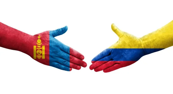 Handslag Mellan Colombia Och Mongoliet Flaggor Målade Händer Isolerad Transparent — Stockfoto
