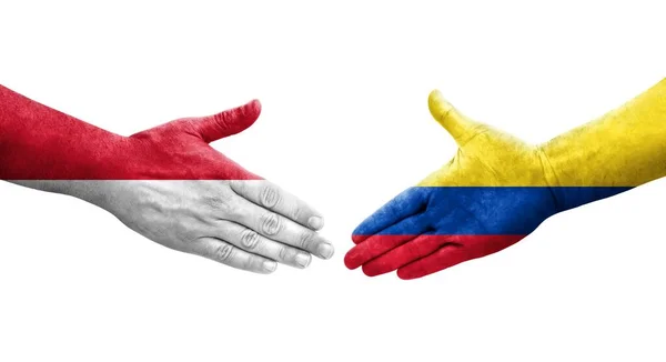 哥伦比亚和摩纳哥之间握手 手绘国旗 孤立透明的图像 — 图库照片