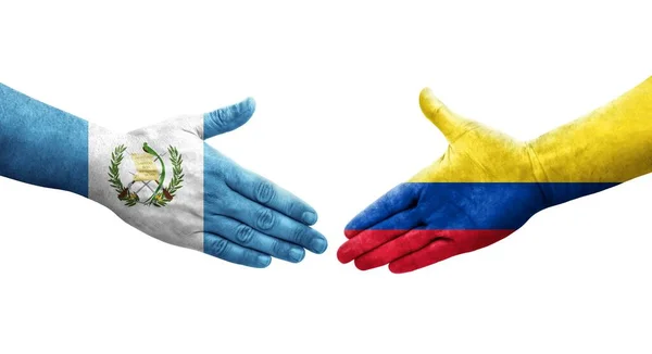 Χειραψία Μεταξύ Κολομβίας Και Γουατεμάλας Σημαίες Ζωγραφισμένα Στα Χέρια Απομονωμένη — Φωτογραφία Αρχείου