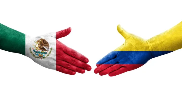 手に描かれたコロンビアとメキシコの旗の間の握手 隔離された透明画像 — ストック写真