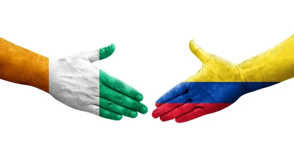 哥伦比亚和象牙海岸的国旗之间的握手 孤立透明的图像 — 图库照片