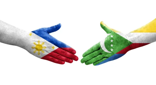 Uścisk Dłoni Między Flagami Komorów Filipin Namalowany Rękach Odizolowany Przezroczysty — Zdjęcie stockowe