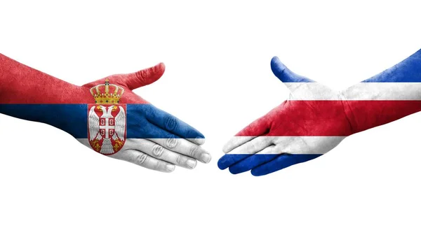 Χειραψία Μεταξύ Κόστα Ρίκα Και Σερβίας Σημαίες Ζωγραφισμένες Στα Χέρια — Φωτογραφία Αρχείου