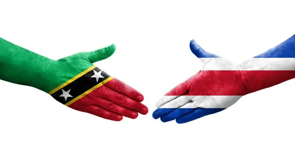 Händedruck Zwischen Costa Rica Und Kitts Und Nevis Flaggen Auf — Stockfoto