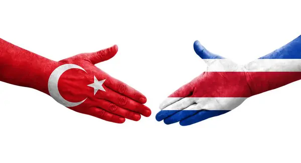 Рукостискання Між Коста Рикою Турецькими Прапорами Намальоване Руках Ізольоване Прозоре — стокове фото