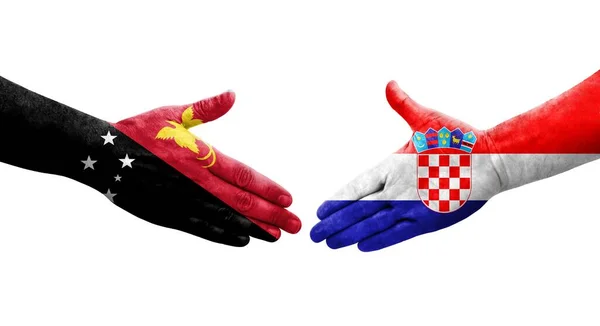 Handslag Mellan Kroatien Och Papua Nya Guinea Flaggor Målade Händer — Stockfoto
