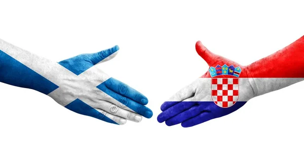 Uścisk Dłoni Między Chorwacją Szkocją Flagi Malowane Rękach Odizolowany Przezroczysty — Zdjęcie stockowe