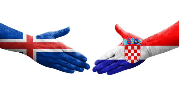 Händedruck Zwischen Kroatien Und Island Fahnen Auf Hände Gemalt Isoliertes — Stockfoto