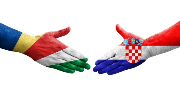 Handslag Mellan Kroatien Och Seychellerna Flaggor Målade Händer Isolerad Transparent — Stockfoto