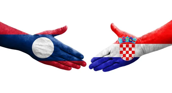Handslag Mellan Kroatien Och Laos Flaggor Målade Händer Isolerad Transparent — Stockfoto