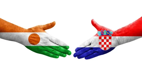 Рукостискання Між Хорватією Нігерійським Прапором Намальоване Руках Ізольоване Прозоре Зображення — стокове фото