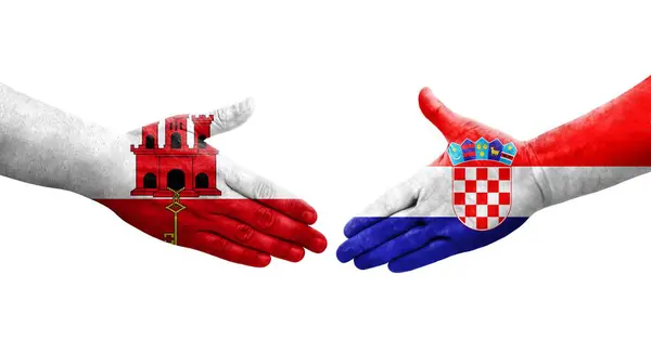 Рукостискання Між Хорватією Гібралтарськими Прапорами Намальоване Руках Ізольоване Прозоре Зображення — стокове фото