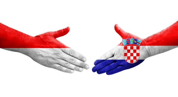크로아티아와 인도네시아의 국기가 그려지는 가운데 이미지를 악수를 — 스톡 사진