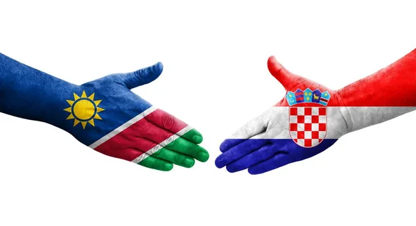 Handslag Mellan Kroatien Och Namibia Flaggor Målade Händer Isolerad Transparent — Stockfoto