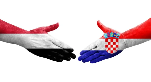 Handslag Mellan Kroatien Och Jemen Flaggor Målade Händer Isolerad Transparent — Stockfoto