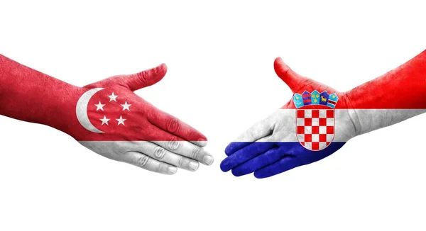 Рукостискання Між Хорватією Сінгапурськими Прапорами Намальоване Руках Ізольоване Прозоре Зображення — стокове фото